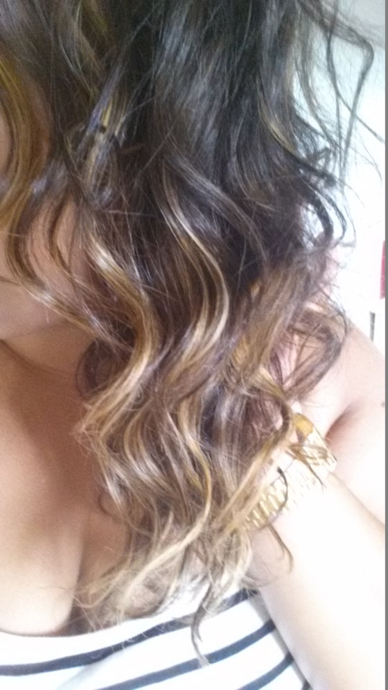 I curled all of my hair, once I was finished I opened up the curls to create the wavy look I was going for