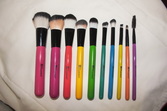 I've been loving the angled blush brush and this sort of dense tapered one (yellow handle) to add highlight to my upper cheek bones.