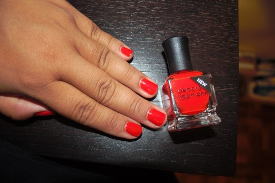 I am currently wearing "Don't stop Believing" the perfect red-orange color