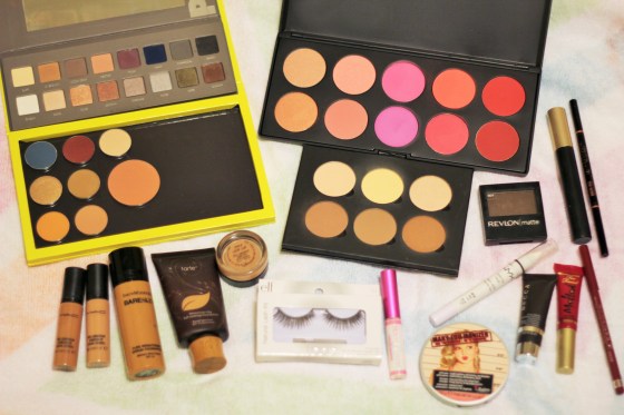 Face: Becca Ever matte primer, Tarte Amazonian clay in the shade tan-deep sand mixed with Bare Minerals Bareskin Foundation in the shade Bare Caramel. Mac pro long-wear concealer in the shade W35 & W30 Anastasia contour kit in the shade Havana, MAC prep and prime in the shade Bright Forecast. BH Cosmetics blush palette (berry shades to the top right) Mary- Lou- Manizer for highlight.  Eyes: MAC paint pot in layin low. NYX jumbo pencil in white. Buff (brow highlight) Rose (lid)from Lorac Pro Palette 2, Revlon Matte shadow in Rich sable (crease) and Makeup geek's Bitten (outer corner). Loreal voluminous mascara, E.L.F Lashes and Sephora Rio nights gel eyeliner. Brows: Anastasia brow wiz (dark Brown) and dipbrow pomade (medium brown) Lips: Rimmel Lip Liner in Cherry kiss, Too Faced Melted lipsticks in the shade Berry. 